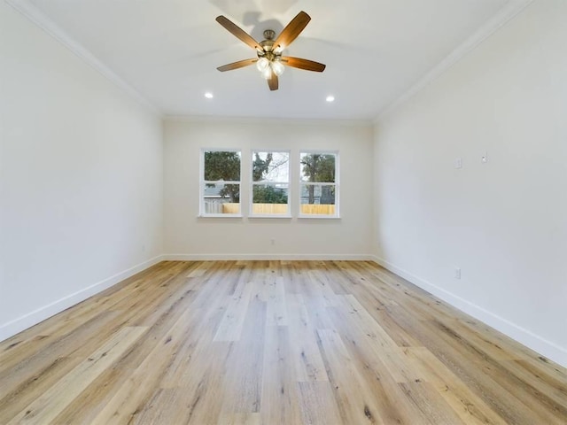 unfurnished room featuring light hardwood / wood-style flooring, ornamental molding, and ceiling fan