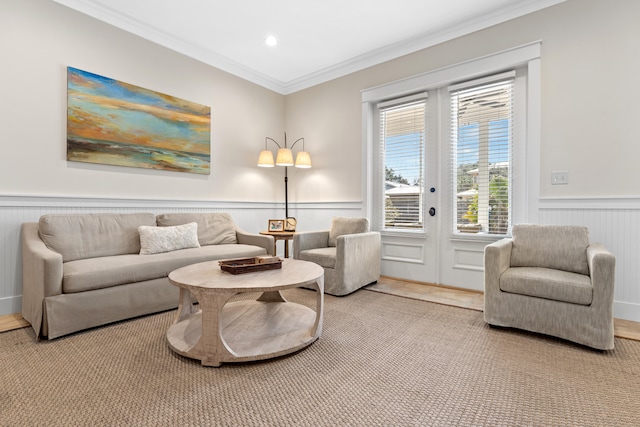 sitting room featuring crown molding