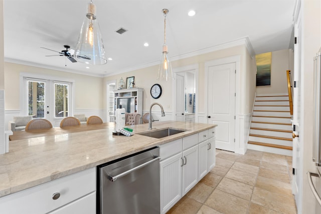 kitchen featuring white cabinets, light stone counters, dishwasher, crown molding, and sink