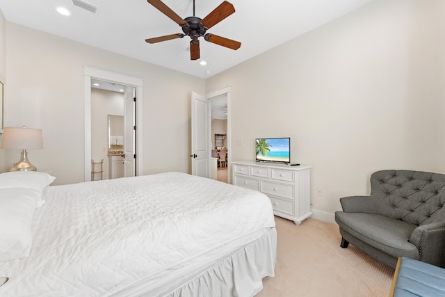 bedroom featuring ceiling fan and light carpet