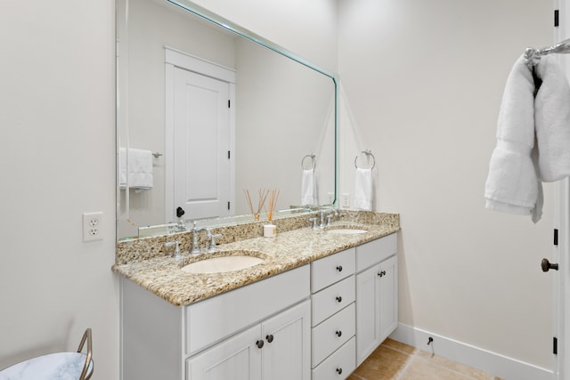 bathroom with vanity and tile patterned floors