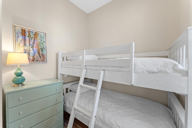 bedroom with vaulted ceiling