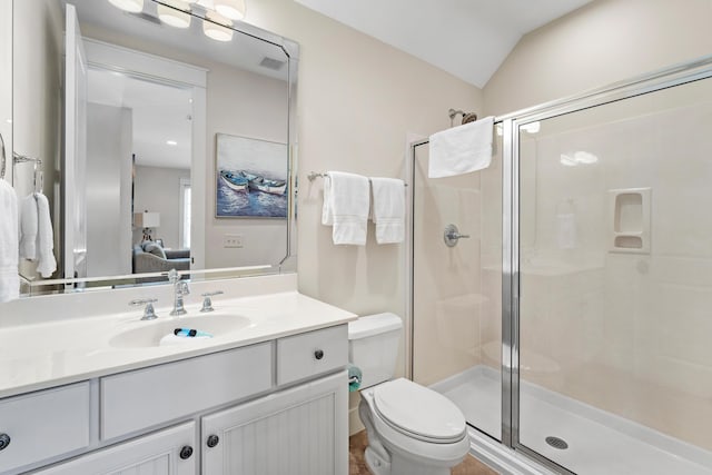 2448 Bungalo Ln, Miramar Beach, FL 32550 - bathroom with a stall shower, vanity, toilet, and vaulted ceiling