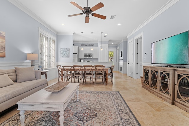 2452 Bungalo Ln, Miramar Beach, FL 32550 - living area featuring ornamental molding, ceiling fan, a wainscoted wall, and recessed lighting