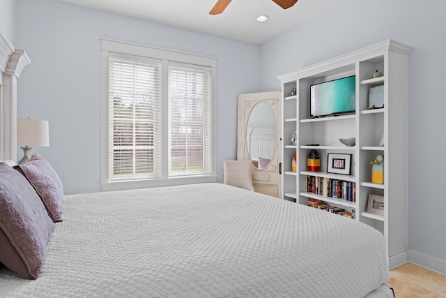 2452 Bungalo Ln, Miramar Beach, FL 32550 - bedroom with ceiling fan, light tile patterned floors, and baseboards