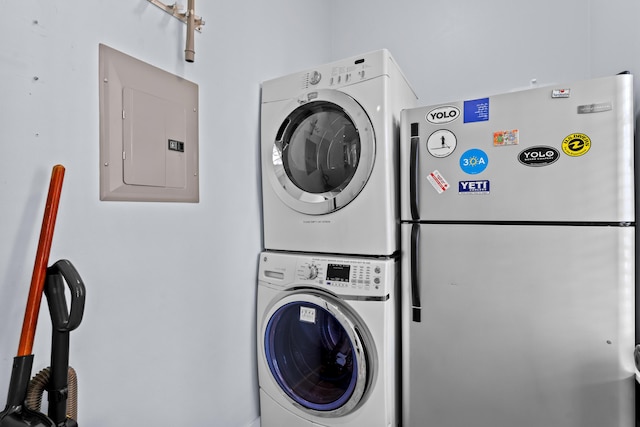 2452 Bungalo Ln, Miramar Beach, FL 32550 - laundry area with electric panel and stacked washer / dryer