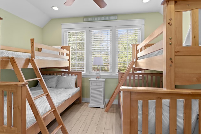 2452 Bungalo Ln, Miramar Beach, FL 32550 - bedroom featuring multiple windows, recessed lighting, wood finished floors, baseboards, and lofted ceiling