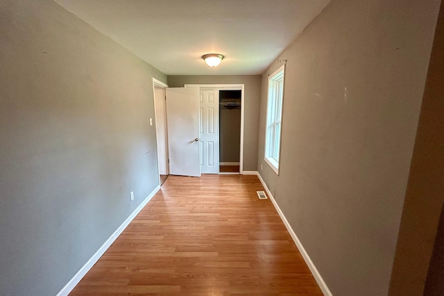 297 Anderson St, Crestview, FL 32536 - hallway featuring light wood finished floors and baseboards