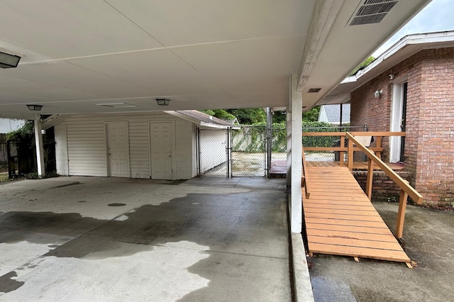 297 Anderson St, Crestview, FL 32536 - view of patio / terrace with a gate and an attached carport