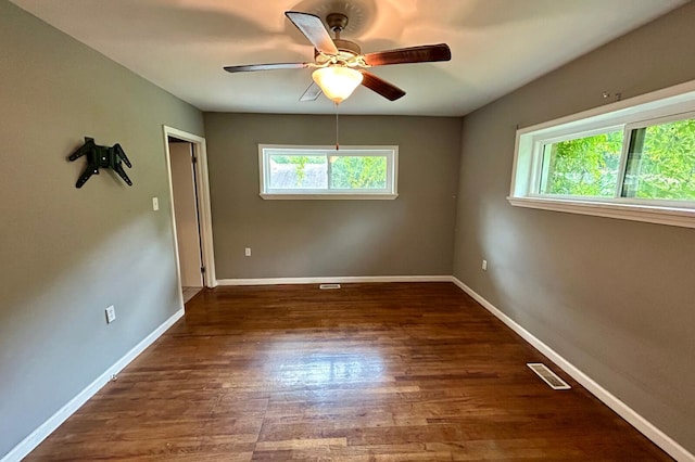 297 Anderson St, Crestview, FL 32536 - unfurnished room with ceiling fan, wood finished floors, and baseboards