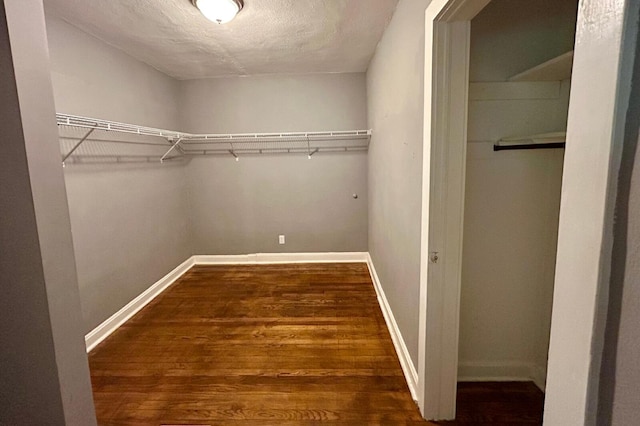 297 Anderson St, Crestview, FL 32536 - spacious closet featuring wood finished floors