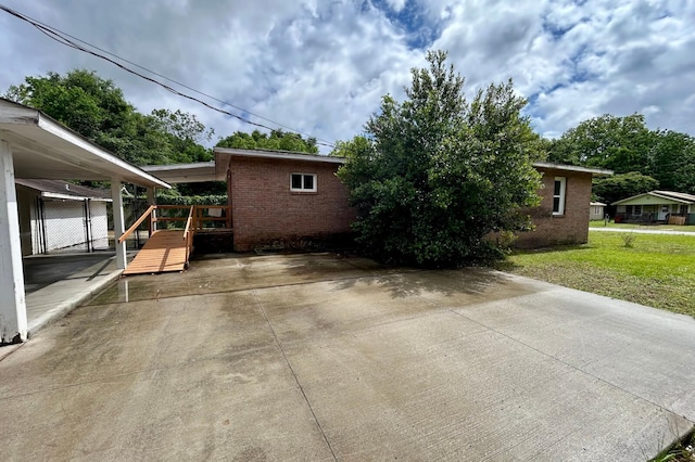 297 Anderson St, Crestview, FL 32536 - view of home's exterior with brick siding