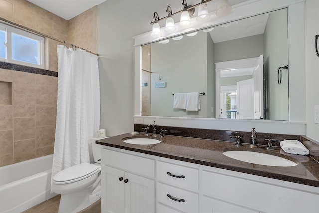 full bathroom with vanity, toilet, shower / bath combo, and tile patterned flooring