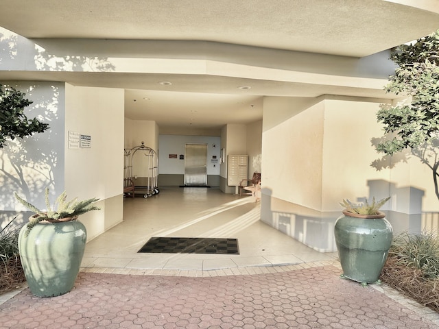 property entrance with a patio