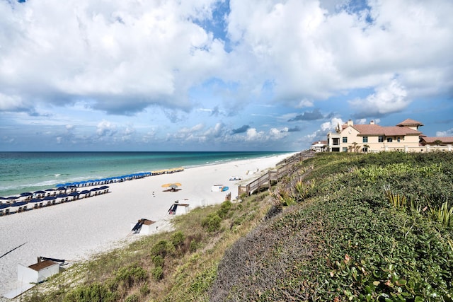 property view of water featuring a beach view