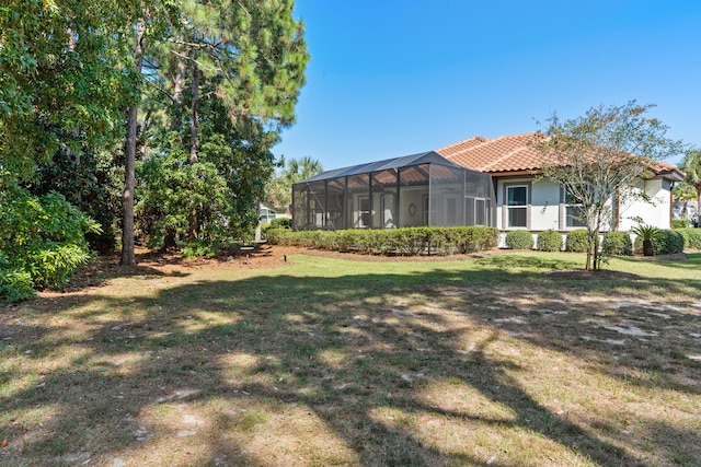 view of yard featuring a lanai