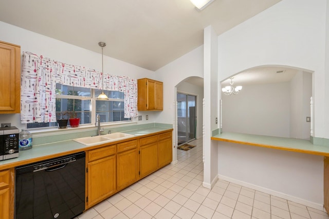 9 Holly Rd, Crestview, FL 32539 - kitchen featuring a sink, stainless steel microwave, arched walkways, dishwasher, and light tile patterned flooring