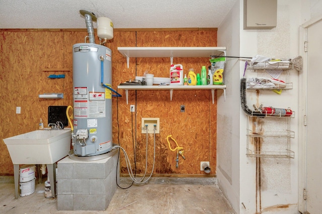 utilities featuring water heater and sink