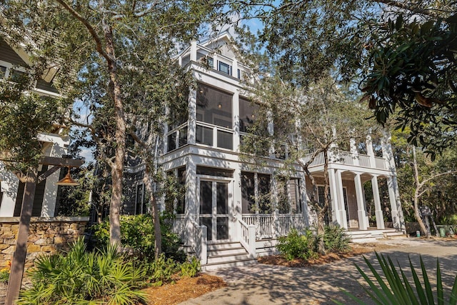 view of front of home with a balcony