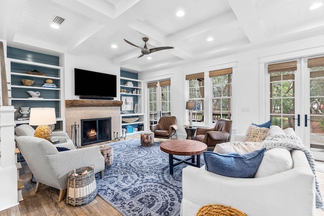79 Cedar Post Rd, Santa Rosa Beach, FL 32459 - living room featuring beam ceiling, built in features, wood-type flooring, and coffered ceiling