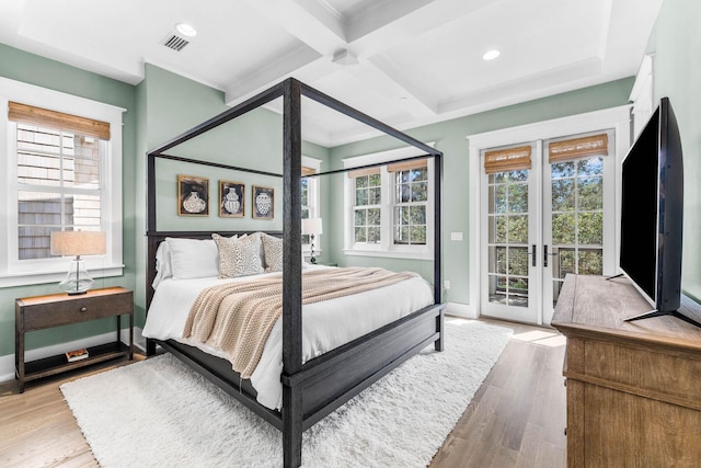 79 Cedar Post Rd, Santa Rosa Beach, FL 32459 - bedroom with access to outside, light hardwood / wood-style flooring, multiple windows, and coffered ceiling