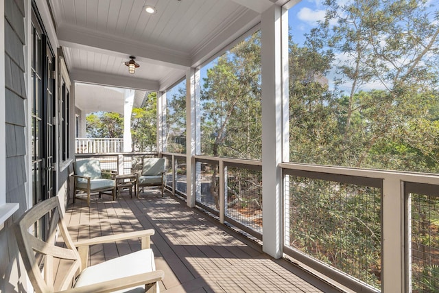 79 Cedar Post Rd, Santa Rosa Beach, FL 32459 - unfurnished sunroom with beamed ceiling
