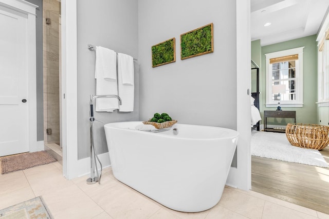 79 Cedar Post Rd, Santa Rosa Beach, FL 32459 - bathroom with separate shower and tub and tile patterned floors