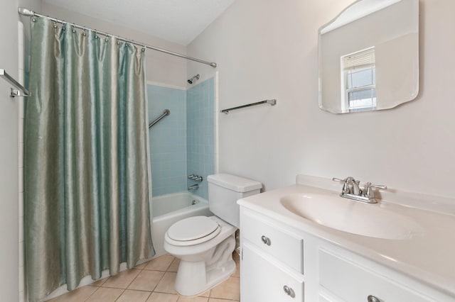 full bathroom with a textured ceiling, toilet, tile patterned floors, vanity, and shower / tub combo with curtain