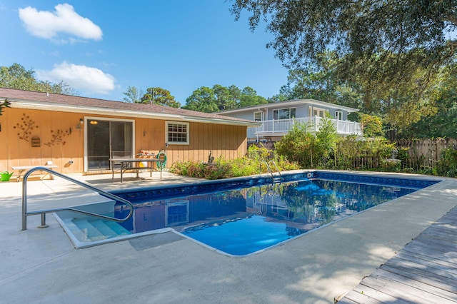 view of pool featuring a patio area