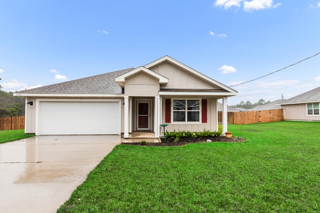 view of front facade featuring a garage and a front yard