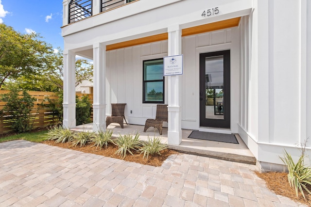 entrance to property with covered porch