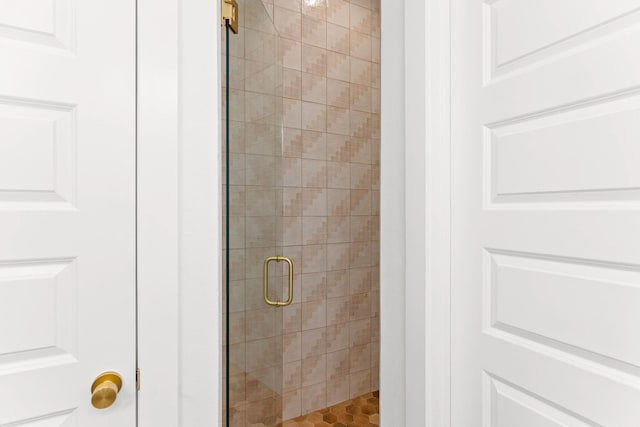 bathroom featuring an enclosed shower