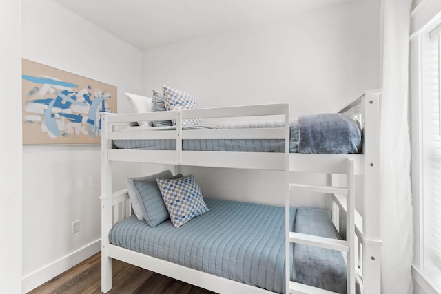 bedroom with hardwood / wood-style floors