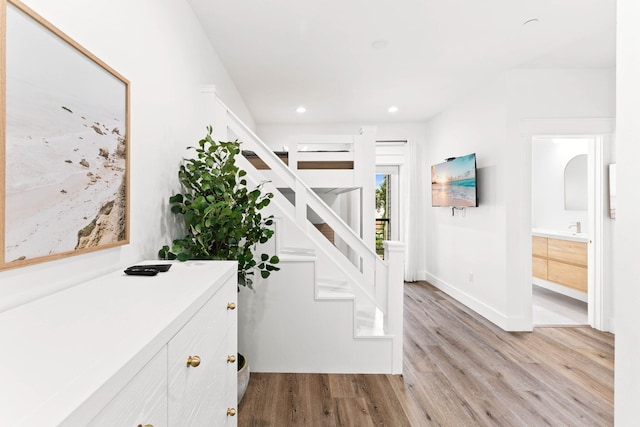 stairway with wood-type flooring