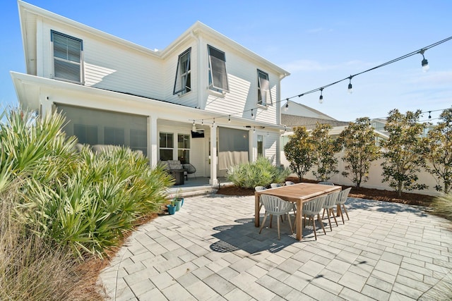 rear view of house with a patio