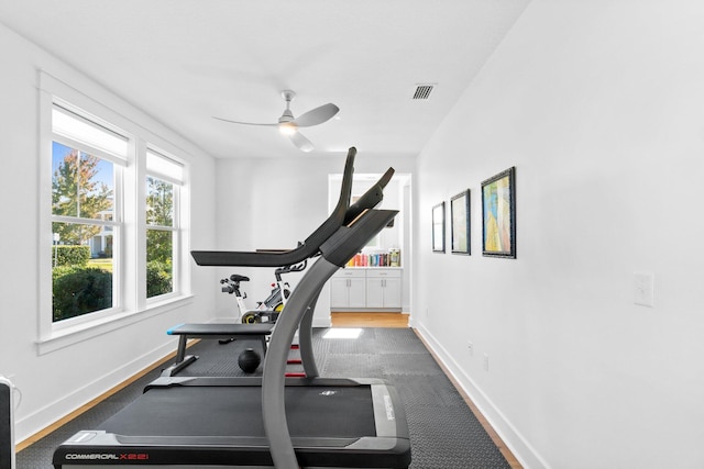 exercise room featuring ceiling fan