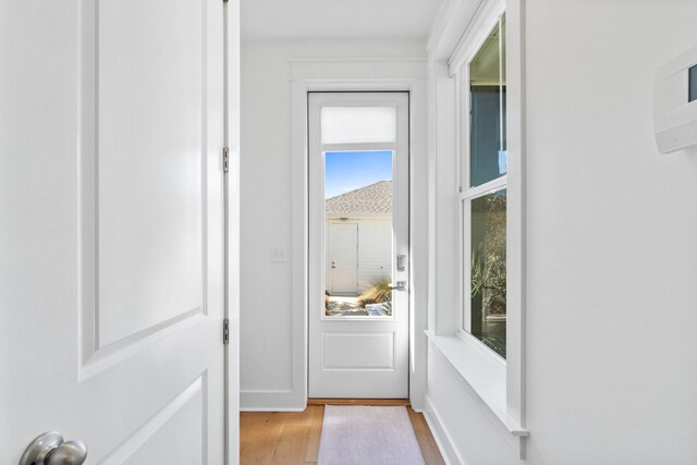 doorway featuring light hardwood / wood-style floors