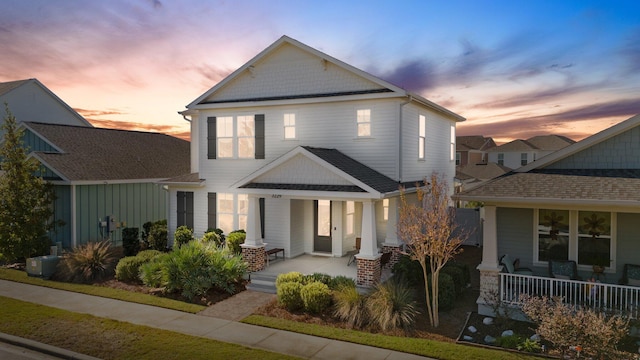 front facade featuring covered porch