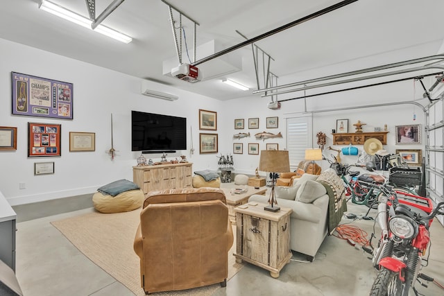 garage with a garage door opener and an AC wall unit