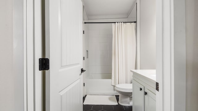 full bathroom with shower / bath combo, vanity, and toilet