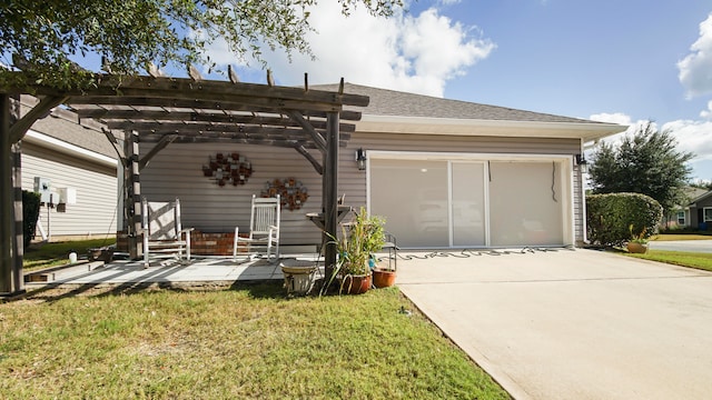 exterior space featuring a front lawn, a garage, and a pergola