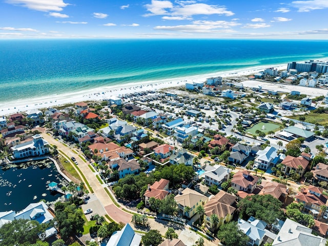 drone / aerial view with a view of the beach and a water view