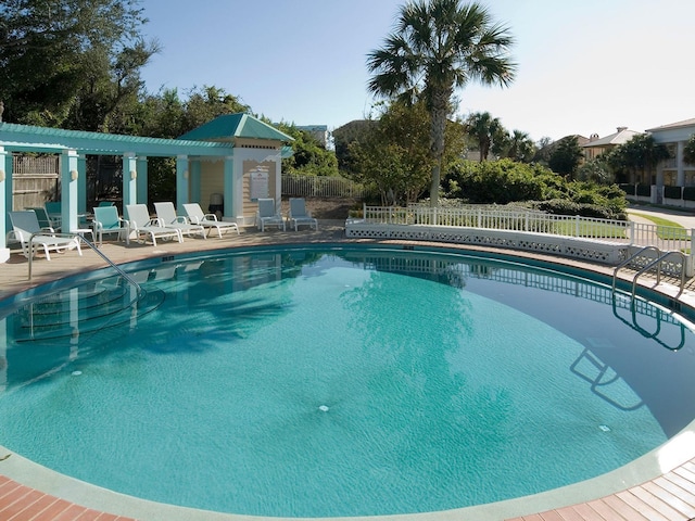 view of pool featuring a patio