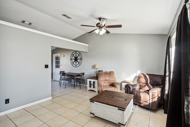 tiled living room featuring lofted ceiling and ceiling fan