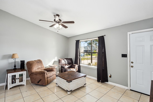 tiled living room featuring ceiling fan