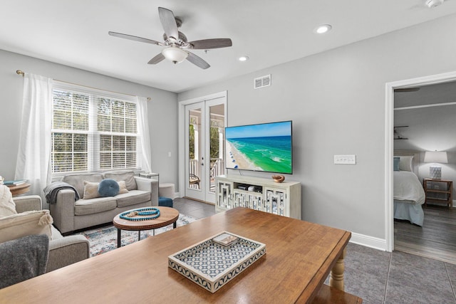 living room featuring recessed lighting, a ceiling fan, baseboards, visible vents, and tile patterned floors