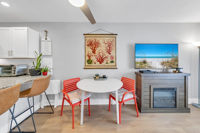 dining room featuring light hardwood / wood-style flooring