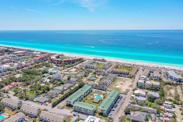 aerial view with a view of the beach and a water view