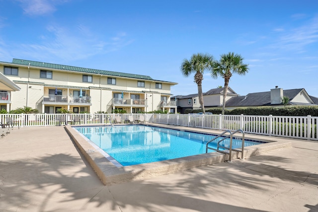 view of pool with a patio