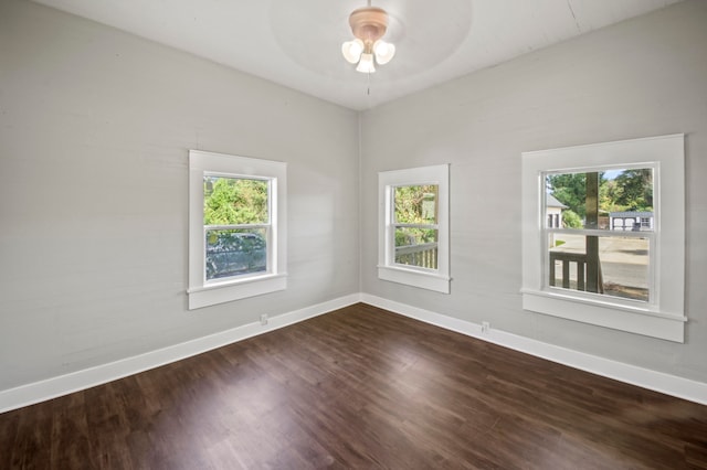 empty room featuring wood-type flooring and ceiling fan